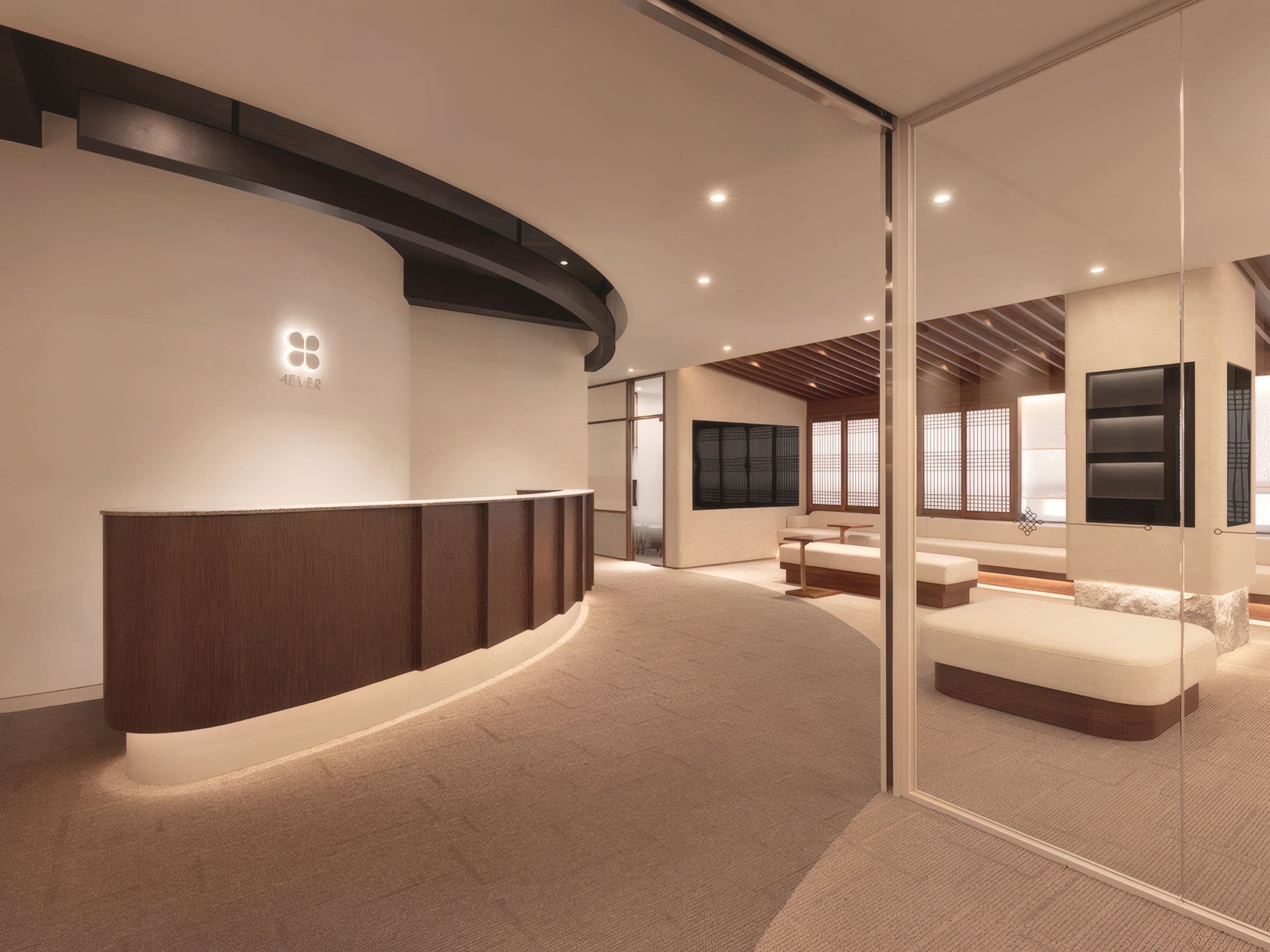 Reception desk and wood-framed lounge at 4EVER162 in Hongdae